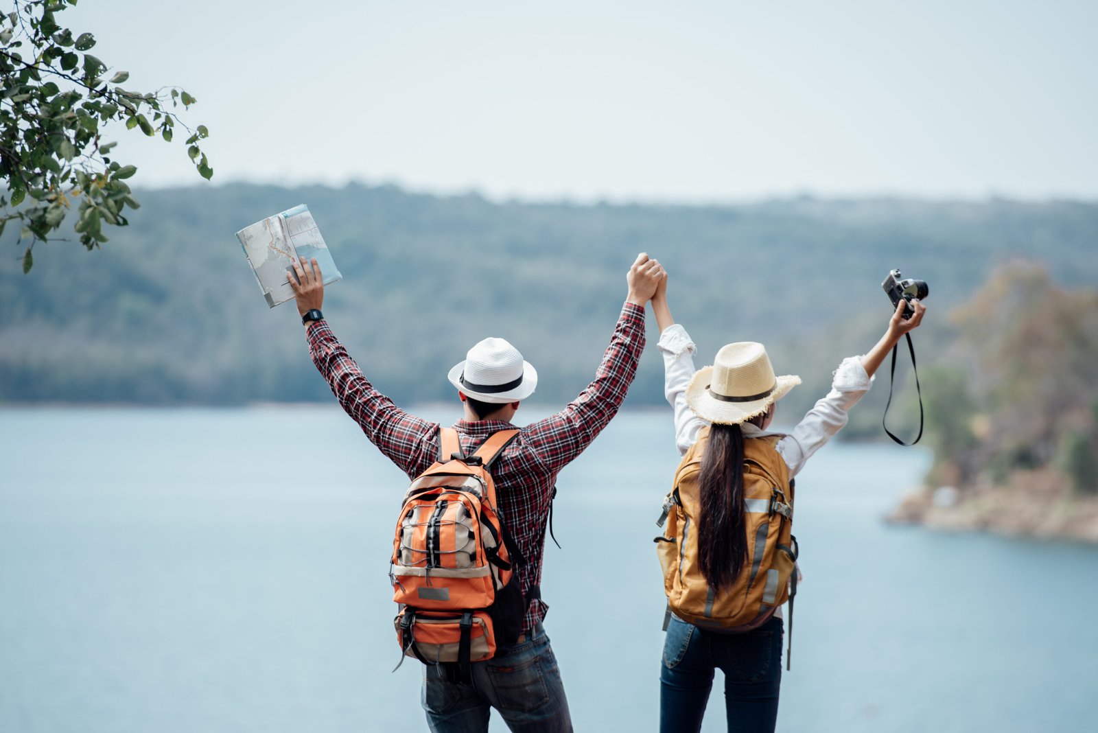 Couple family traveling together,Tourist couple Backpack along m